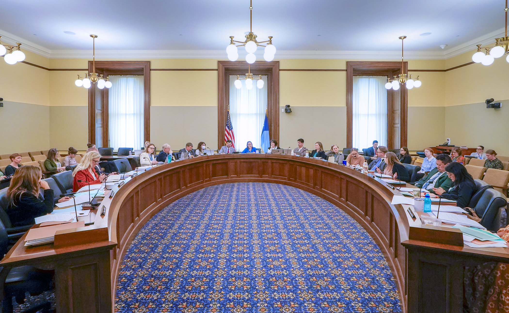 The House Children and Families Finance and Policy Committee discuss the committee finance bill April 15. (Photo by Andrew VonBank)